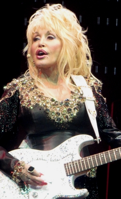 Dolly Parton Playing Guitar With Long Nails